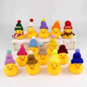 yellow duck toy with christmas hat